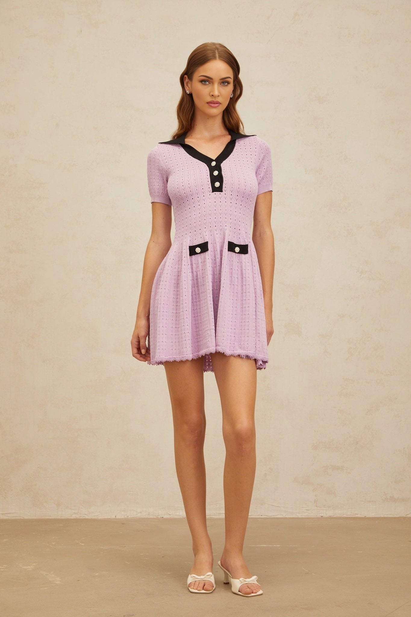 Purple and black short sleeve A-line dress with notched lapels and decorative buttons