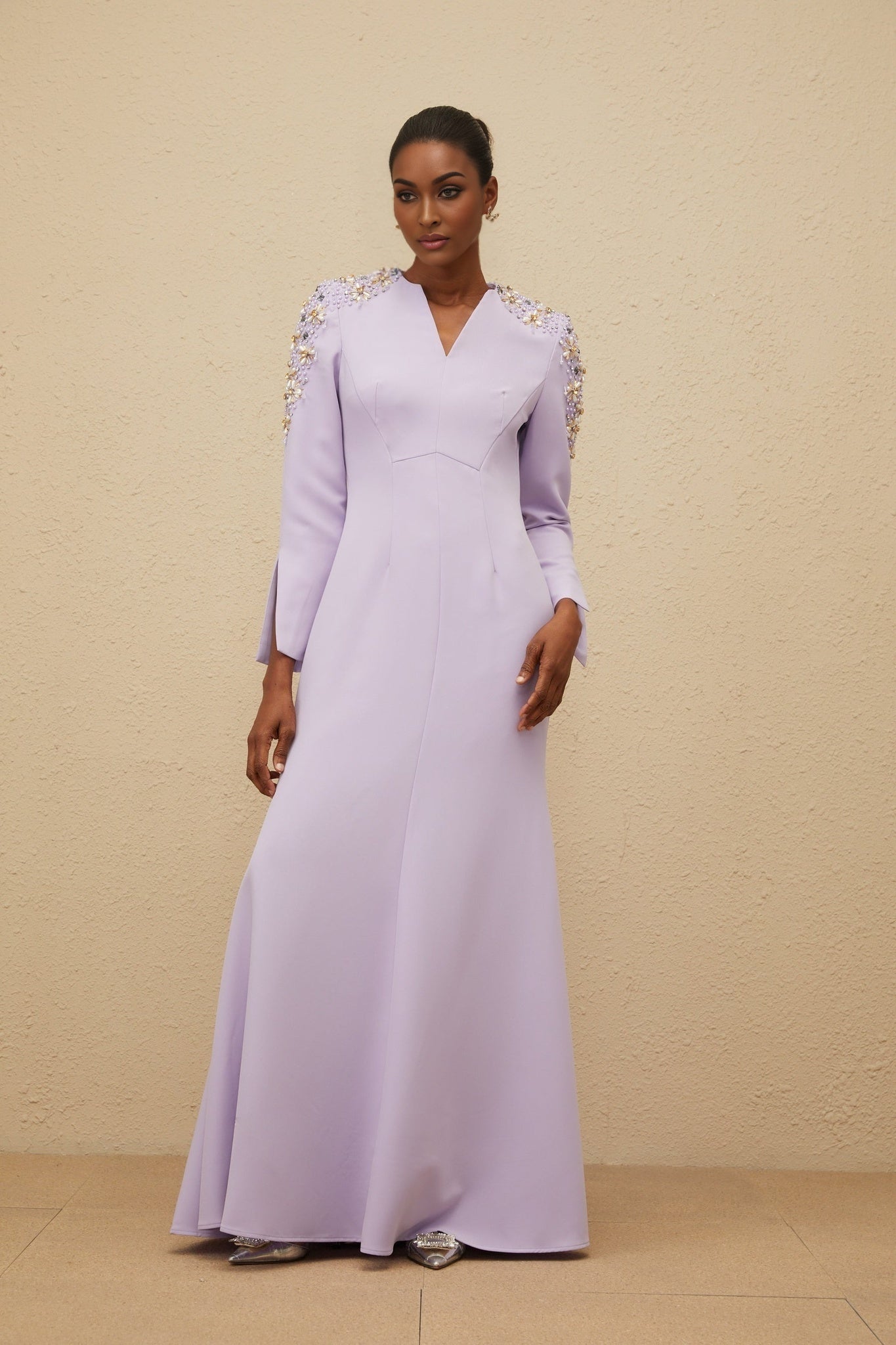 Purple long sleeve V-neck dress with faux pearl and crystal embellishments