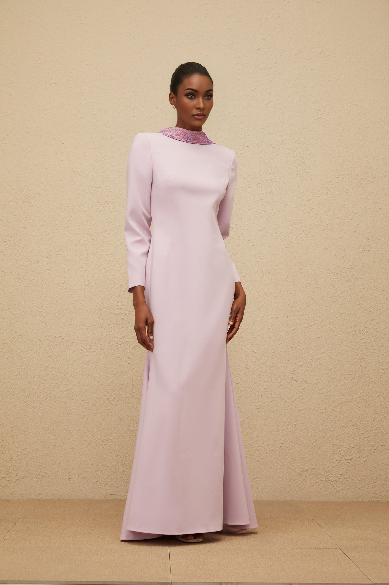 Purple mock neck long sleeve dress with open back and faux-flower detailing