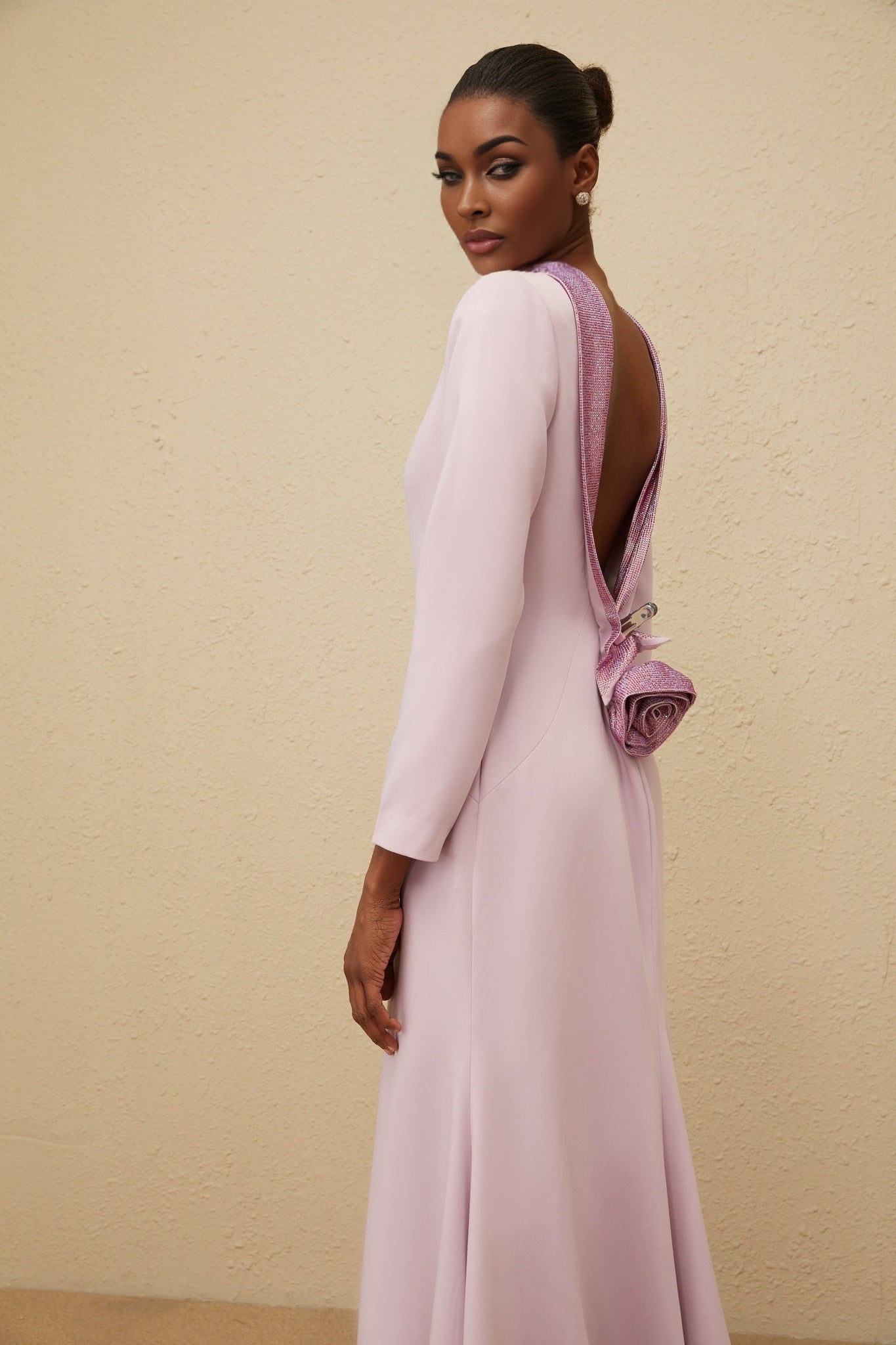 Purple mock neck long sleeve dress with open back and faux-flower detailing