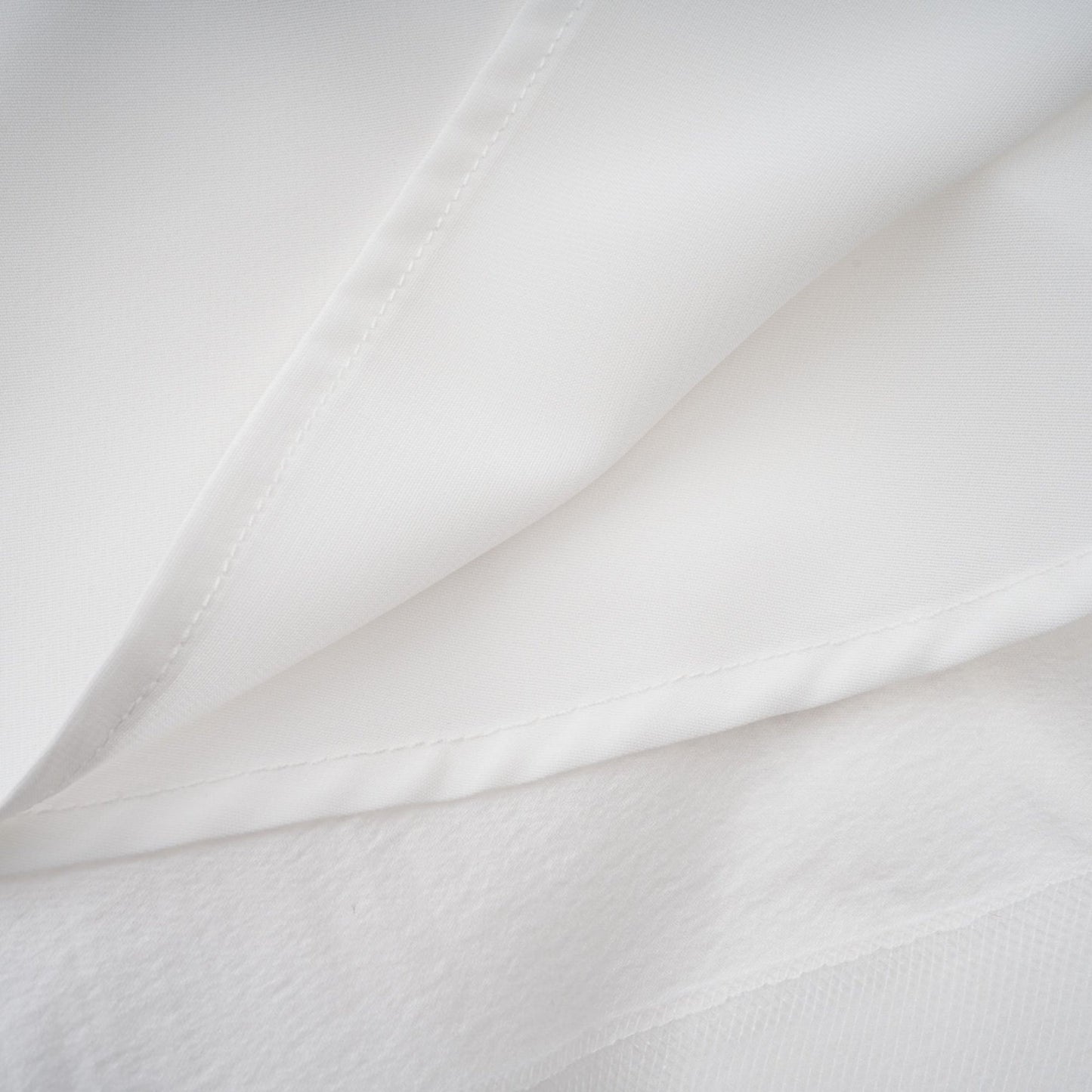 Quincie white shirred flounced mini dress