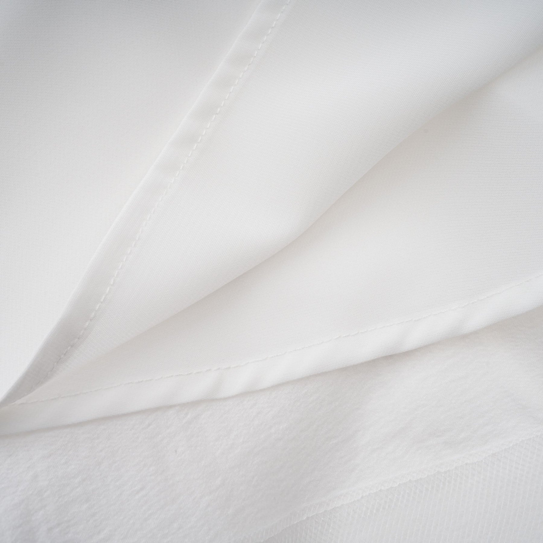 Quincie white shirred flounced mini dress