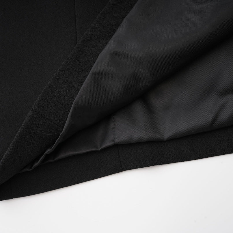 Raegan Black Wool Mini Dress with Shoulder Pad Elegance and Buckle Detailing