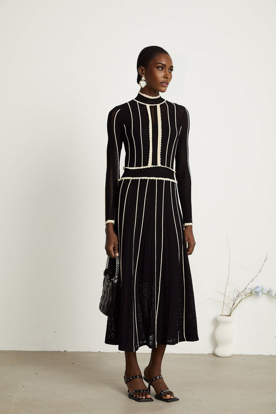 Raffaelina Black and White Maxi Dress with Vertical Stripes and Ruffled Detailing