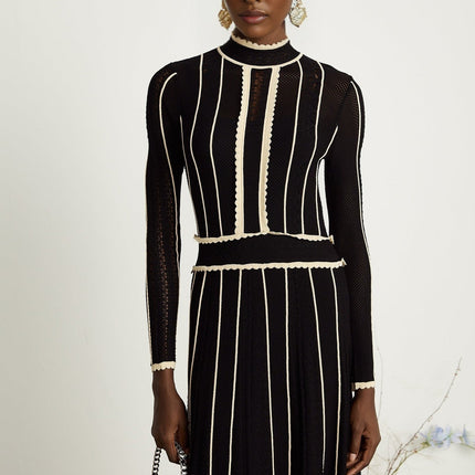 Raffaelina Black and White Maxi Dress with Vertical Stripes and Ruffled Detailing