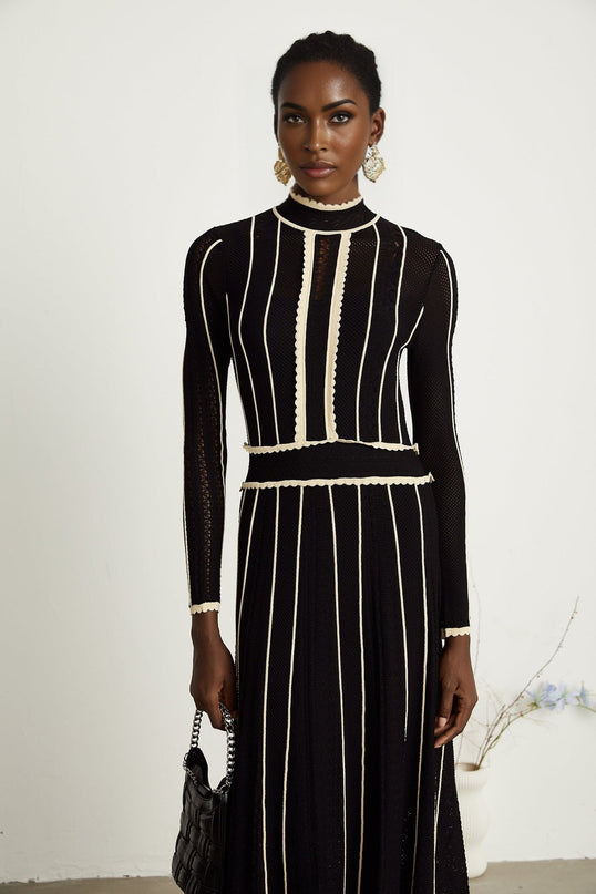 Raffaelina Black and White Maxi Dress with Vertical Stripes and Ruffled Detailing