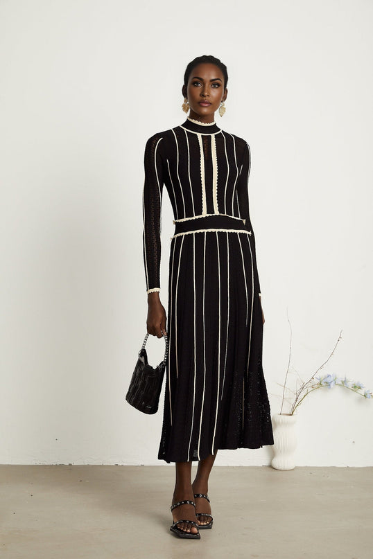 Raffaelina Black Maxi Dress with Vertical Stripes and Ruffled Detailing