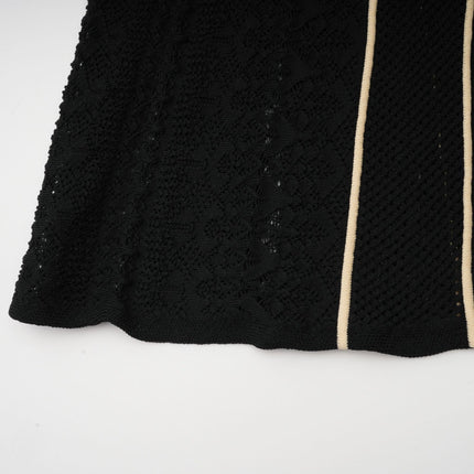 Raffaelina Black and White Maxi Dress with Vertical Stripes and Ruffled Detailing