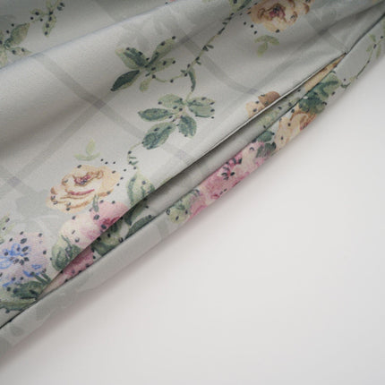 Raven Midi Dress in enchanting green floral with square neck and cinched waist