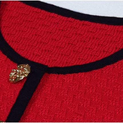 Vintage-inspired red flared skirt with black accents and gold buttons