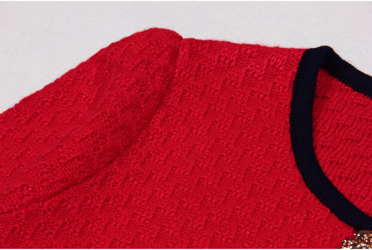 Vintage-inspired red flared skirt with black accents and gold buttons