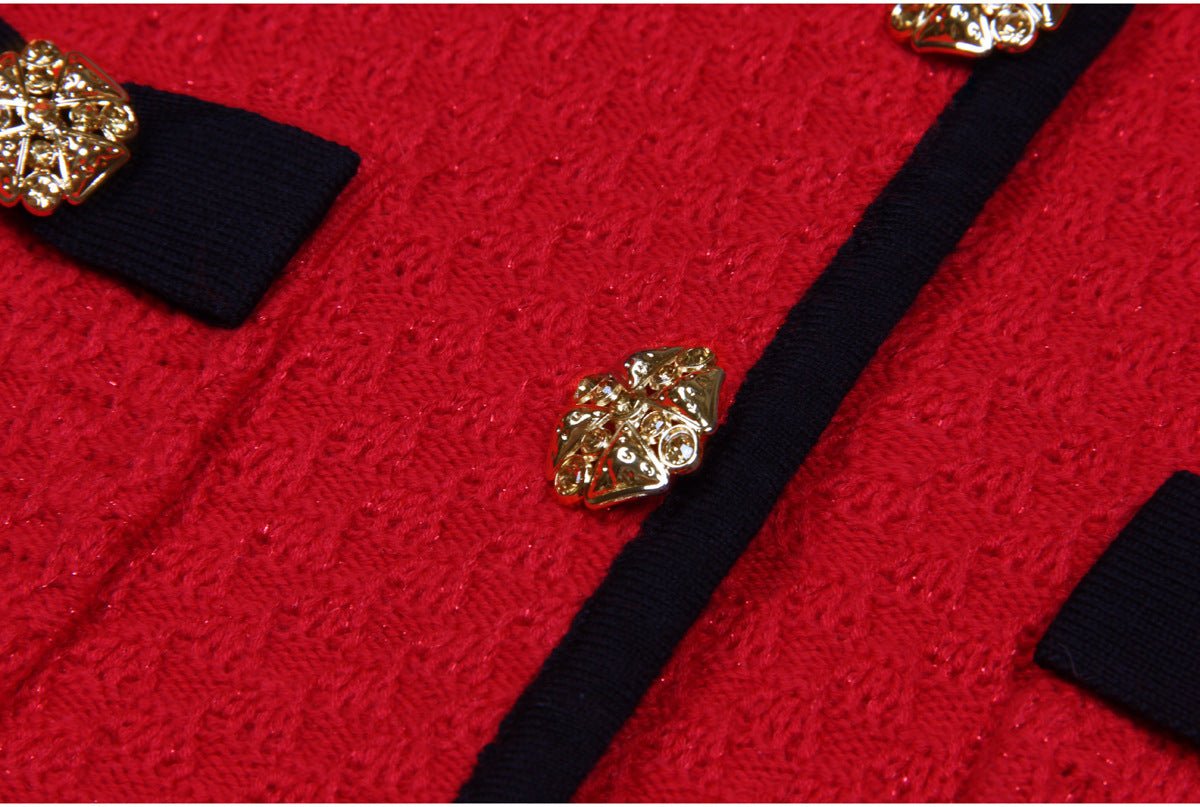 Vintage-inspired red flared skirt with black accents and gold buttons