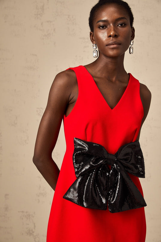 Red mini dress with vneck and sequin bow detail