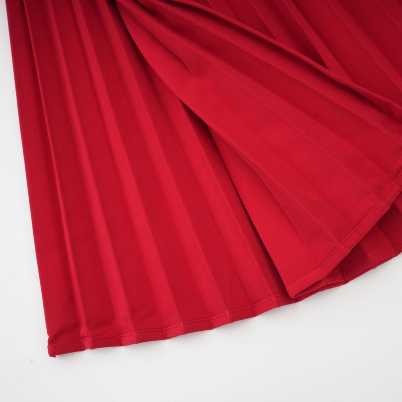 Red pleated maxi dress with high slit for Valentines Day occasion