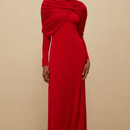 Red stretch cape maxi dress with ruched detailing and rear zip fastening