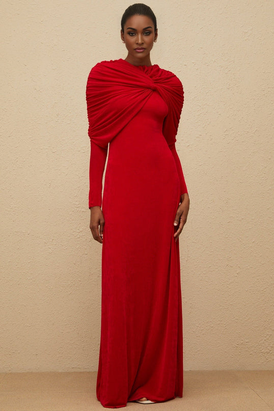 Red stretch cape maxi dress with ruched detailing and rear zip fastening