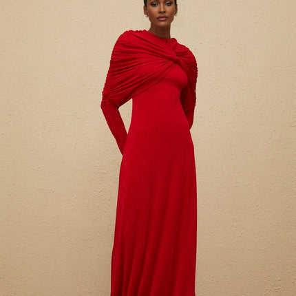 Red stretch cape maxi dress with ruched detailing and rear zip fastening