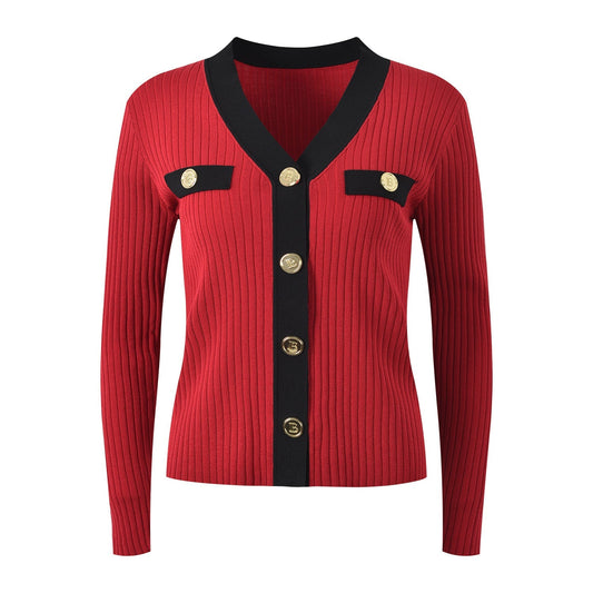 Red V-neck button-down with black accents and gold buttons