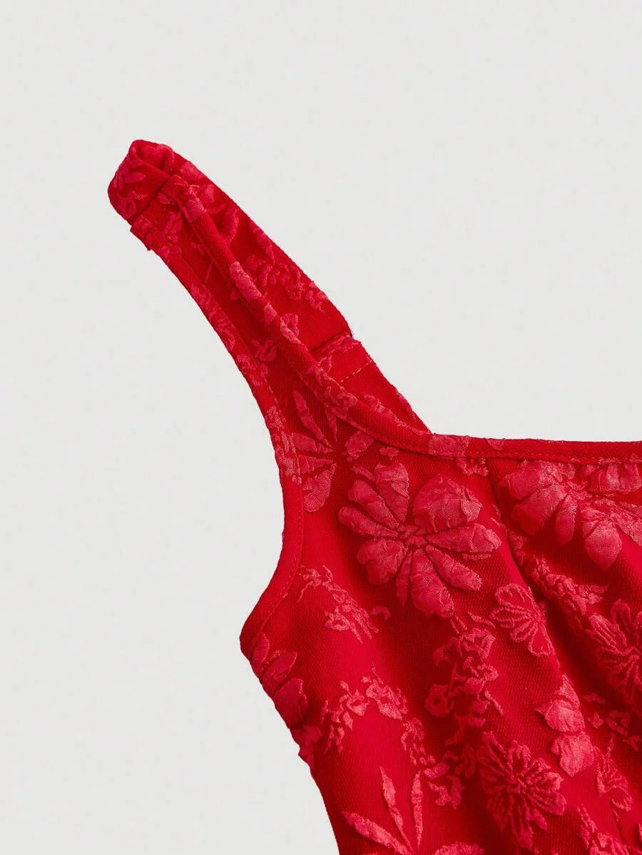 Elegant red jacquard mini dress with a structured bodice, square neckline, and flared skirt, featuring intricate floral patterns for a sophisticated look