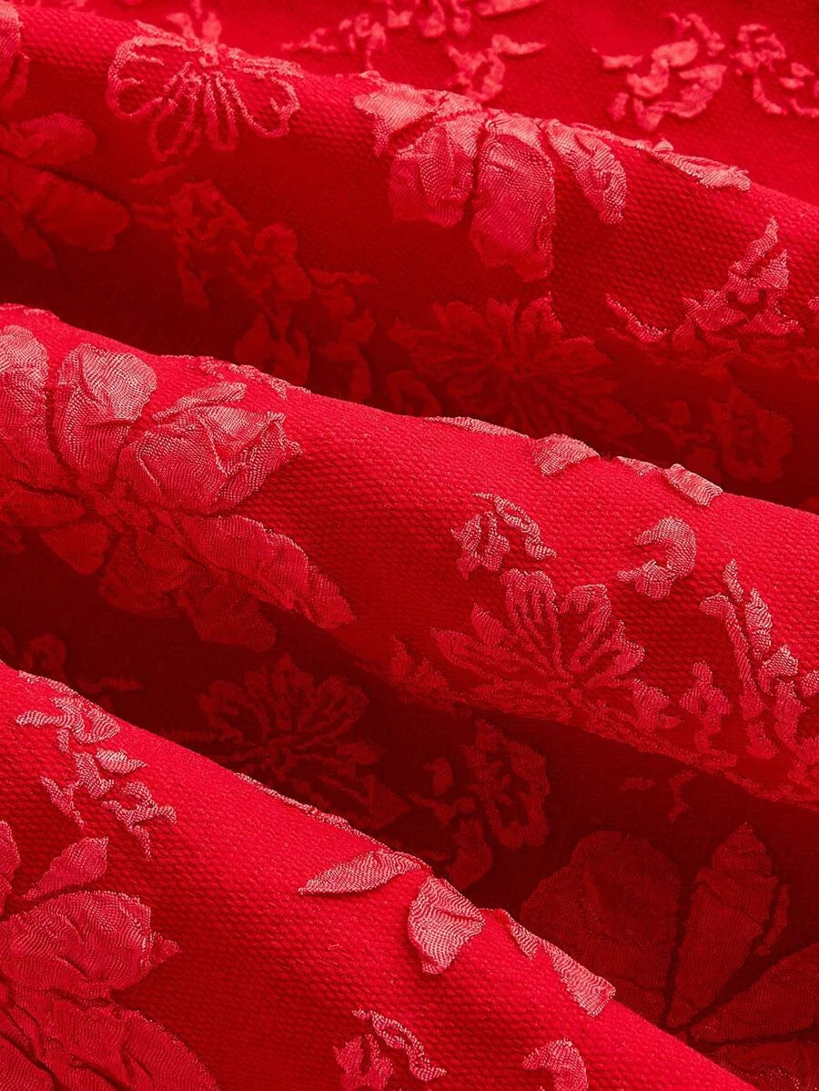 Elegant red jacquard mini dress with a structured bodice, square neckline, and flared skirt, featuring intricate floral patterns for a sophisticated look