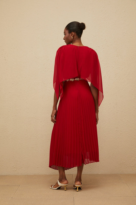 Red V-neck sleeveless maxi dress with cape design and chain-link detailing