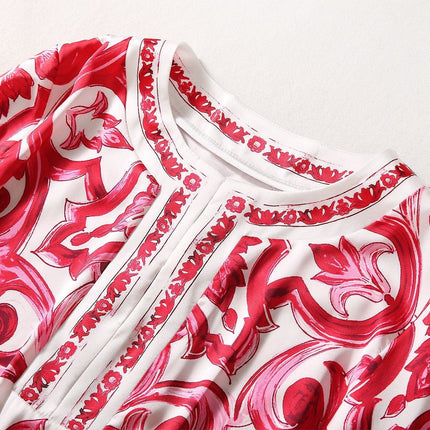Red and white boho-chic maxi dress with baroque-inspired print and bell sleeves