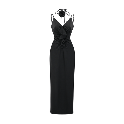 Black anklelength dress with spaghetti straps and a flower decoration at the neck sleeveless with an open back made of 100% Polyester
