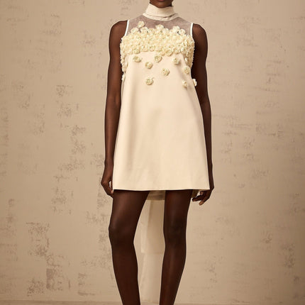 Remi Neutrals Mini Dress high neck sleeveless faux-flower embellishment bow detailing semi-sheer A-line silhouette thigh length rear zip fastening 98% Terylene 2% Spandex