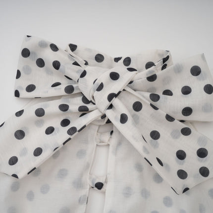 Renata White and Black Polka Dot Halterneck Midi Dress with Bow Embellishment