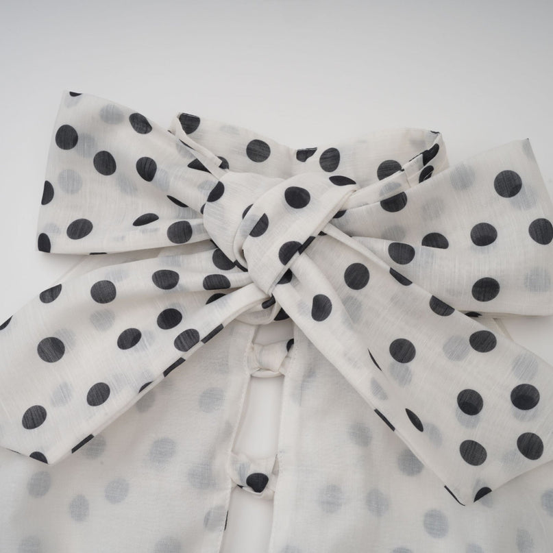 Renata White and Black Polka Dot Halterneck Midi Dress with Bow Embellishment