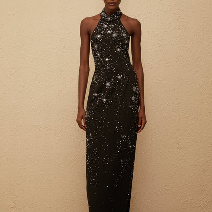 Rhea Maxi Dress in Black halterneck sleeveless fitted waistline metallic threading crystal embellishments side slit straight hem rear button zip fastenings 65% Cotton 35% Terylene fiber