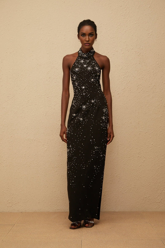 Rhea Maxi Dress in Black halterneck sleeveless fitted waistline metallic threading crystal embellishments side slit straight hem rear button zip fastenings 65% Cotton 35% Terylene fiber