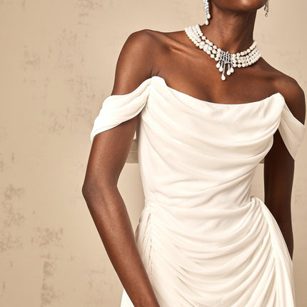Riccarda White Mini Dress with Off-Shoulder Elegance and Ruched Detailing