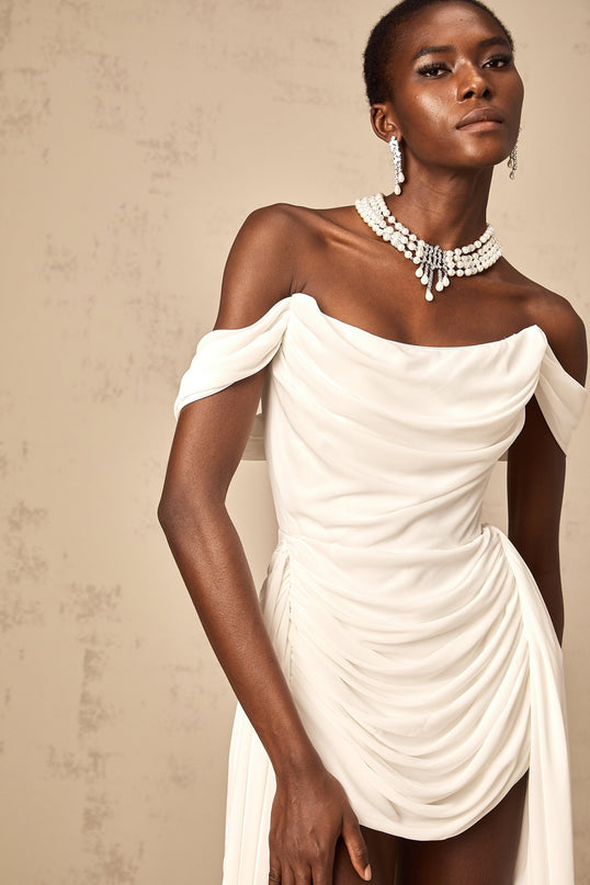 Riccarda White Mini Dress with Off-Shoulder Elegance and Ruched Detailing