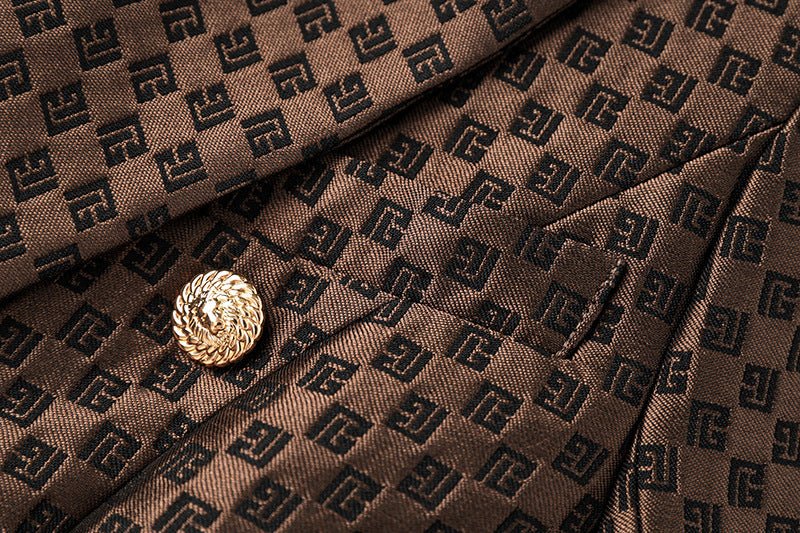 April wears Rich Brown Geometric Double-Breasted Blazer with Gold Buttons