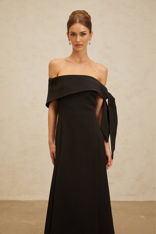 Rina Black Maxi Dress Off-Shoulder Bow Detail Side Slit Fitted Waistline Folded Edge Finish Elegant Self-Tie Bowknot Rear Zip Fastening Formal Special Occasions Impeccable Taste