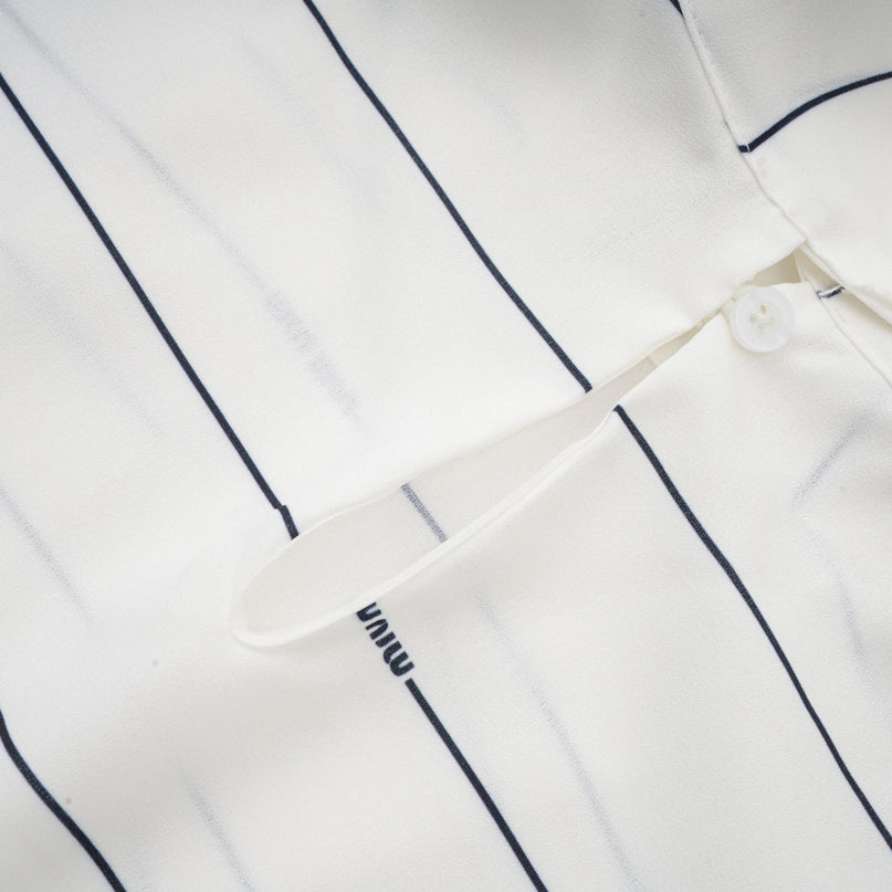 Rinata White Sleeveless Top and Pleated Skirt Matching Set