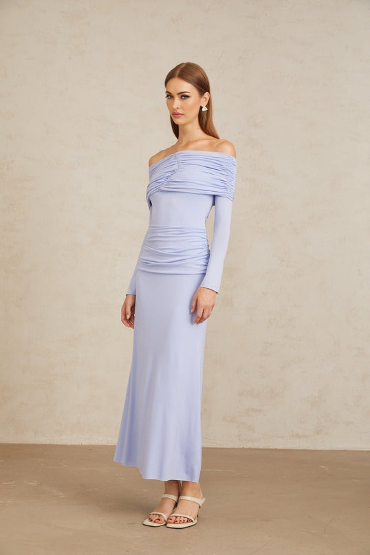 Rosanna Maxi Dress in Light Blue Off-Shoulder Silhouette Flared Sleeves Ruched Detailing Fitted Waistline Stretch Design 100% Terylene Fiber Rear Zip Fastening Maxi Length Special Occasions Elegant Evenings Style Grace