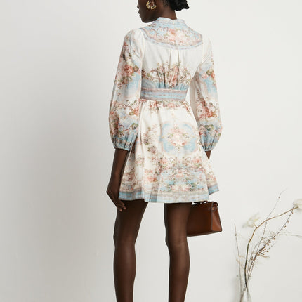 Rosetta White Blue Floral Print Mini Dress with V-neckline and long sleeves