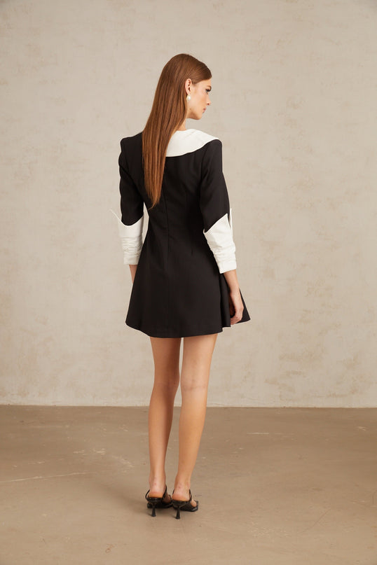 Rowan Black and White Color Block Mini Dress with V-Neckline and Asymmetrical Lapels