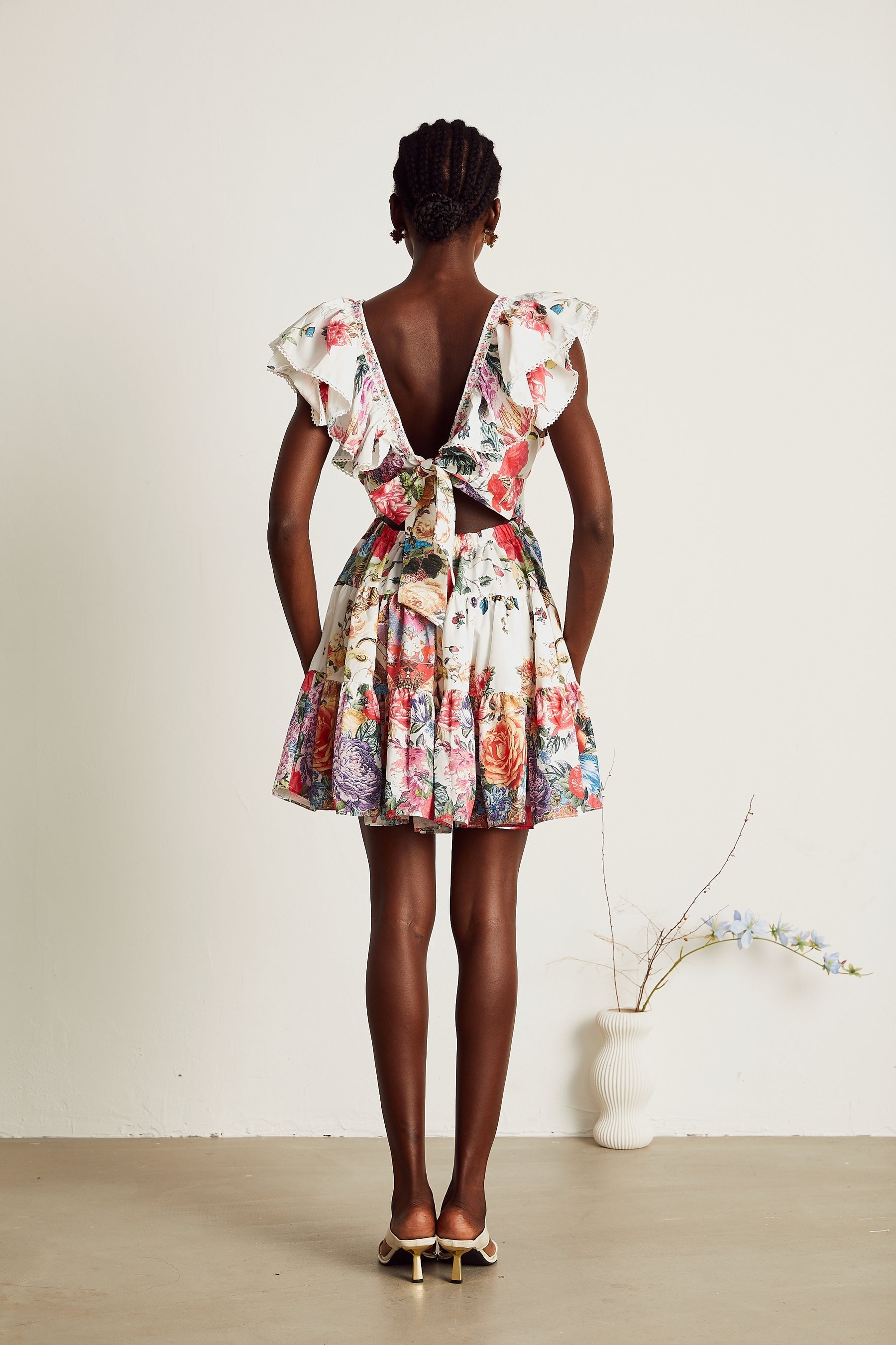 Saige ruffled floralprint mini dress in White