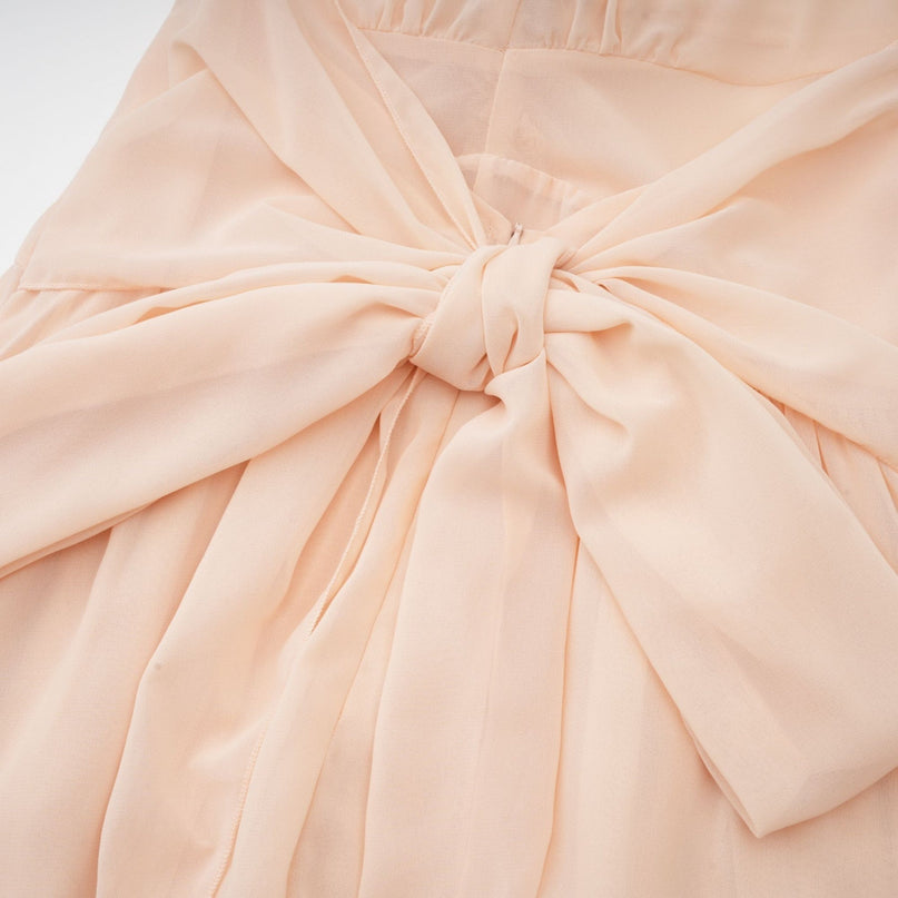 Samantha Halter-neck Maxi Dress in Neutrals Polyester Silk Ruffled Trim Faux Flower Embellishment Side Slit Open Back Sleeveless Elegant Glamourous Statement Piece