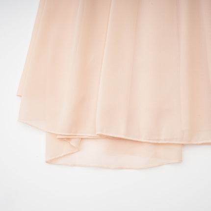 Samantha Halter-neck Maxi Dress in Neutrals with Ruffled Trim and Faux Flower Embellishment