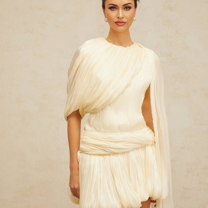 Sara Neutrals Mini Dress with Pleated Fabric, Ribbon Detailing, and Glitter Accents