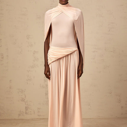 Sarai Maxi Dress in Shrimp Pink Sleeveless Cape Design Pleated Skirt Asymmetrical Silhouette