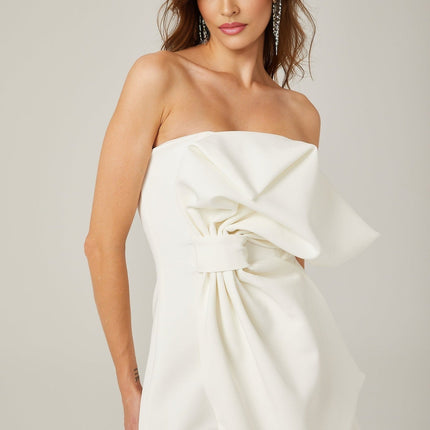 Shayla White Mini Dress with Oversize Bow Off-Shoulder Design 97% Polyester 3% Spandex Rear Zip Fastening Thigh-Length Asymmetric Silhouette