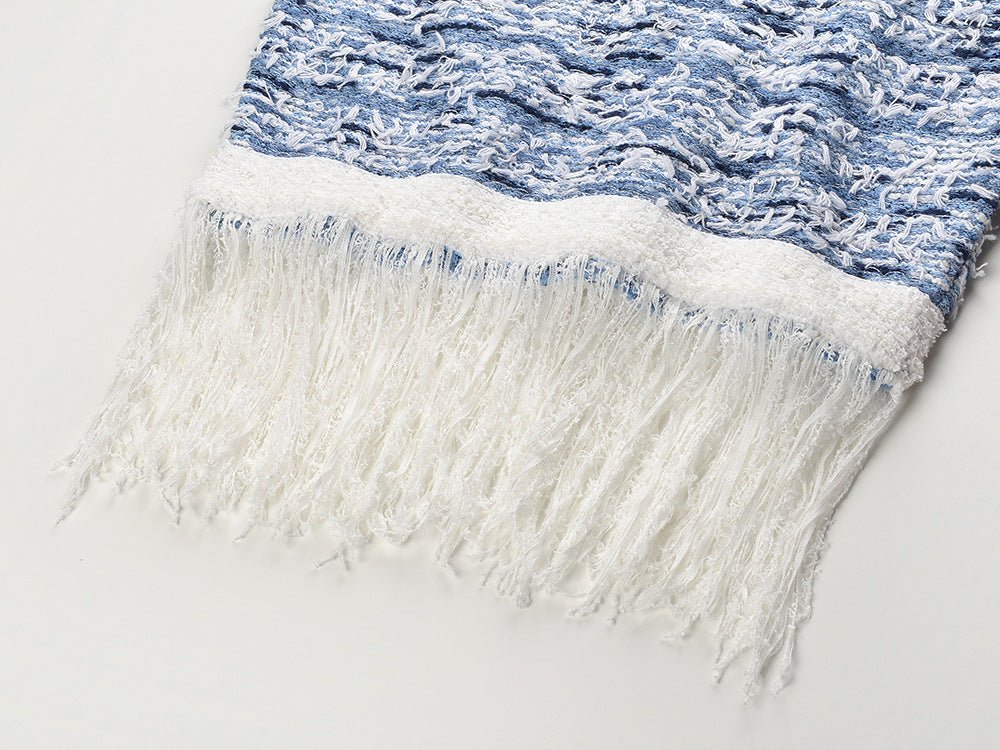 Sleek sleeveless mini dress in Elegant Blue and White with Fringe Hem and Gold Buttons