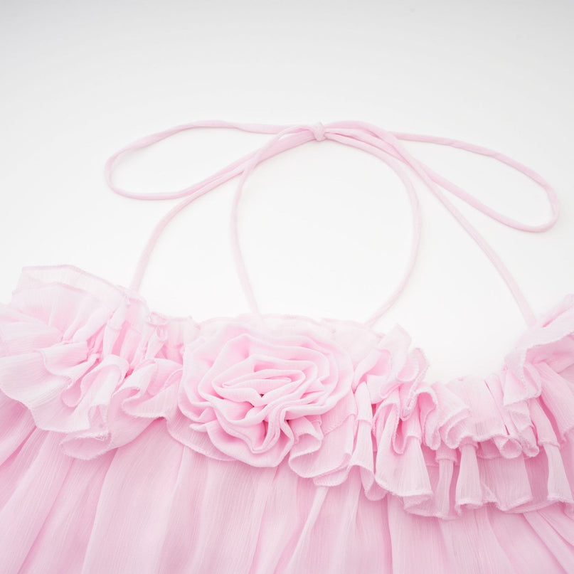 Sleeveless light pink sheer top with straight neckline