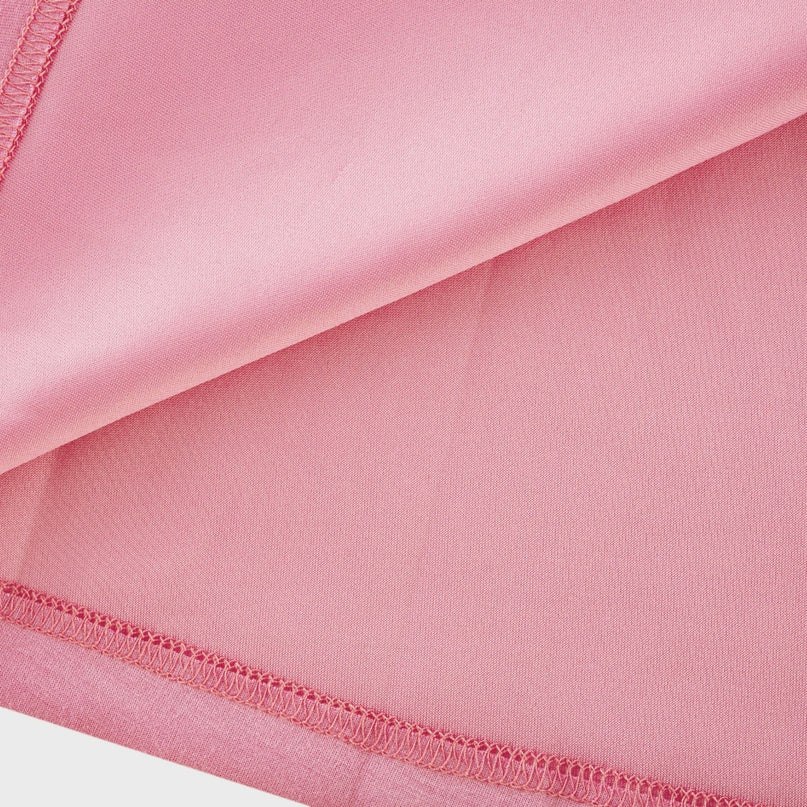 Sleeveless pink maxi dress with bow and artificial flower decoration named Magali