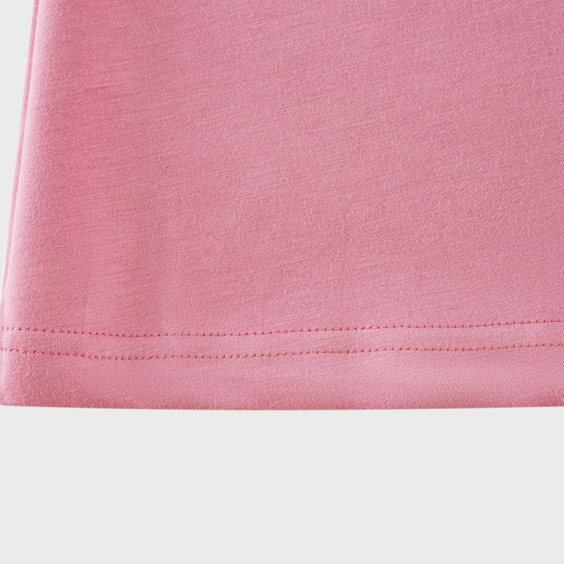 Sleeveless pink maxi dress with bow and artificial flower embellishments named Magali